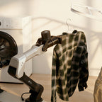 Galaxea Dynamics LEMO A1Z robotic arm hanging laundry to dry